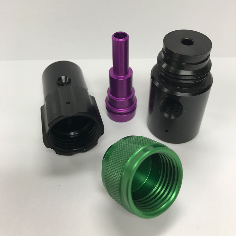 Aluminum parts showcasing tight tolerances achieved through precision machining